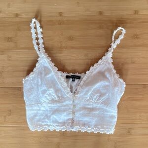 Dainty detailed button top